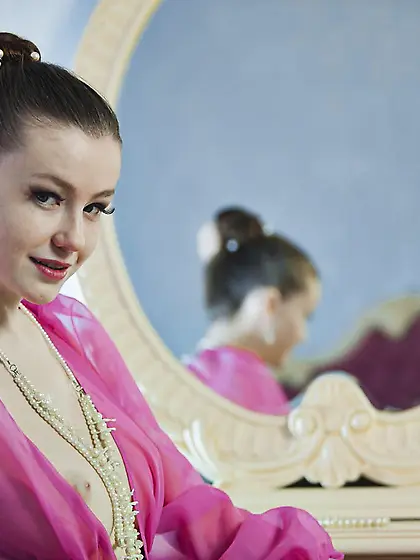 Enchanting full titted brunette Emily Bloom poses in chic pink g