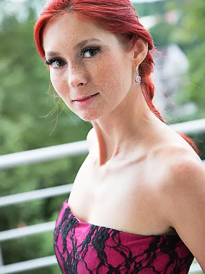 Backseat limo acoustics amplify ecstasy for a skinny redhead