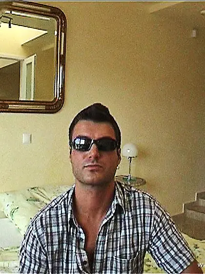 Liz Honey kneels before her hung horny lover and sucks his throb