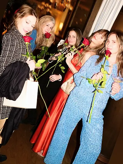 Alison Brie in a red dress