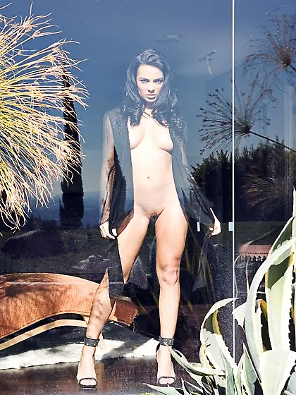 The sun shines through and plays upon the hot body of,  Krista Ay