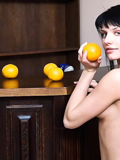 Fun-loving brunette loves oranges and stripping naked for the ca