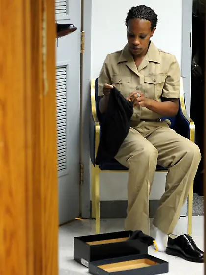 Shalanda tried to hide her face while flashing