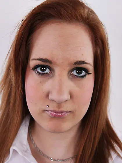 Enticing brunette strip show