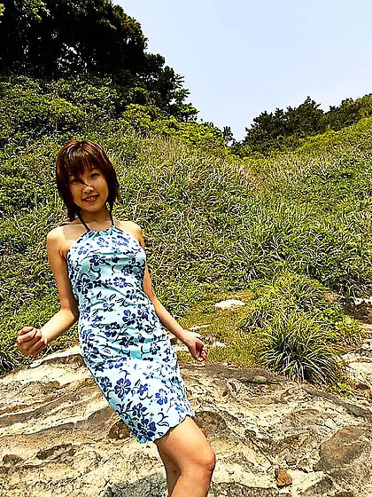 Pretty Asian bimbo Keiko Akino is so slowly stripping off outdoo