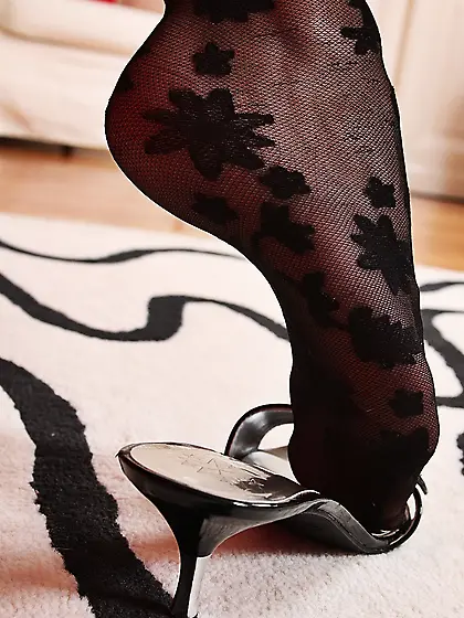 Sweet brunette babe Alexandra Gold in erotic stockings teasing t