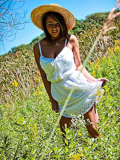 Seductive teen gal Nikki Sims strips her white dress outdoors an