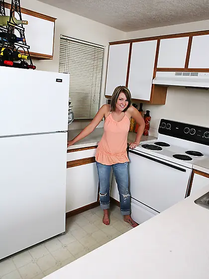 Flirty girl Kelly Faith with playful smile strips to show her bi