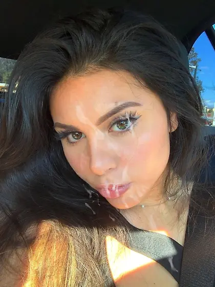 Brunette cum on face selfie in car