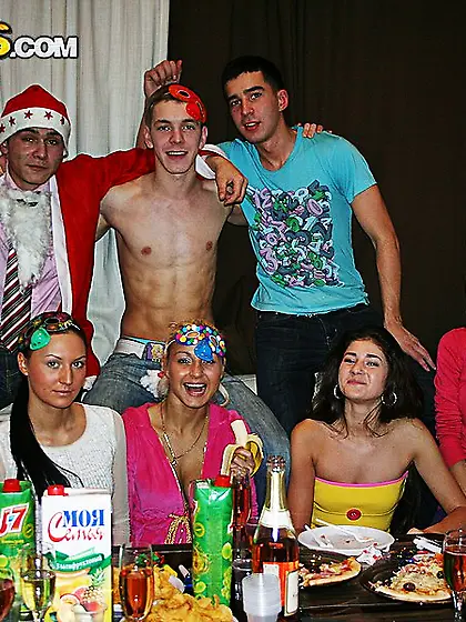 The colege students are having a Christmas sex party together