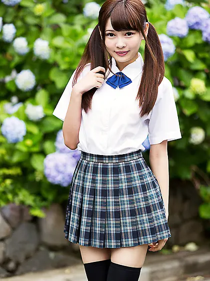 Oriental babe in stockings and checkered skirt has a tight pussy