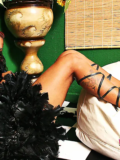 Alessandra Roccos in a boa