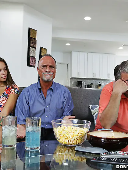 Brown-haired hottie in a colorful t-shirt gets railed from behin