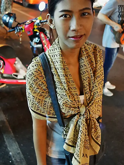 Skinny Thai teen shows off her perky tits and a hairy pussy