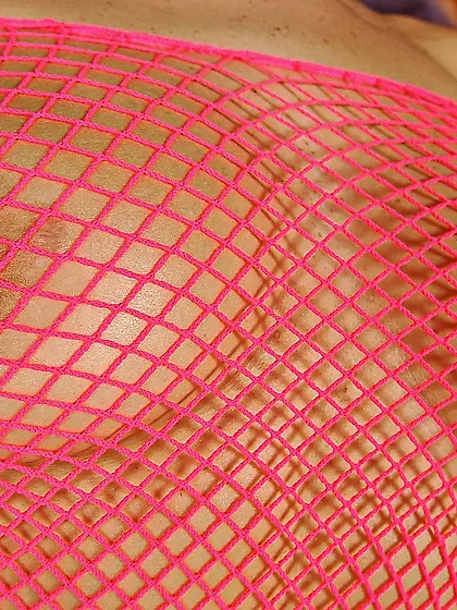 Voluptuous brunette babe Lora Black bares her fishnet top then d