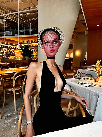 A tight choker around a beautiful long neck