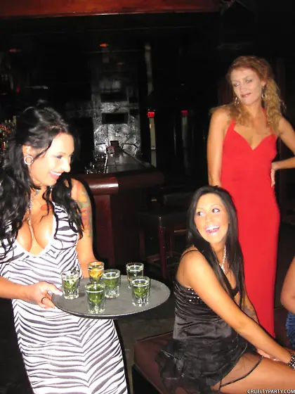 Dress-wearing hotties enjoying a stripper's meaty cock on a