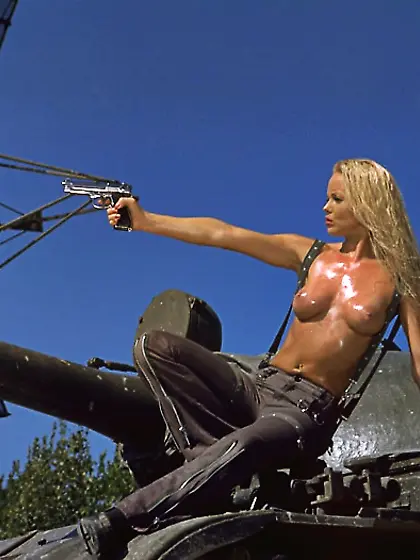 Tall blonde babe with gun Silvia Saint is proud of her tight bod