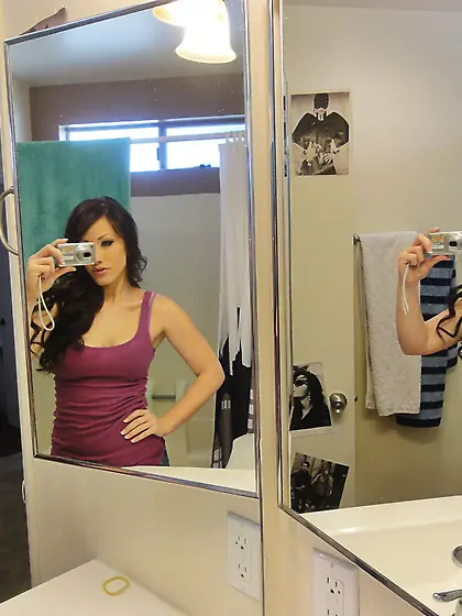 This wild brown haired babe in sexy lingerie will blow your mind