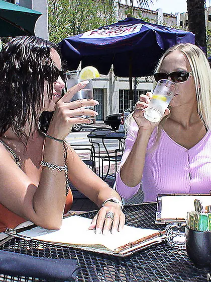 Kristen Cameron and Brianna Ray strip together on the bed and ha