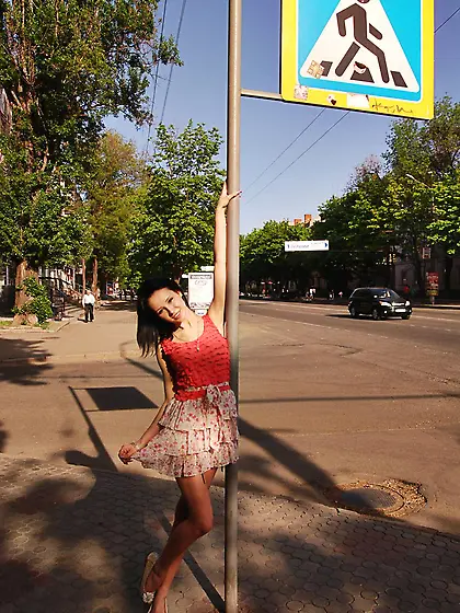 Fantastic cheerful teen brunette Eleonora B washes her car in th