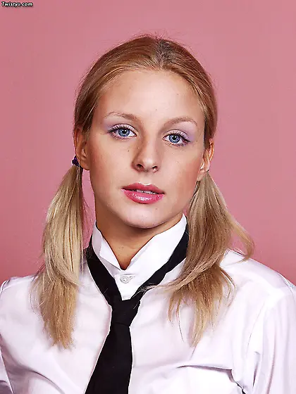Foxy blonde gal Bella Blond strips her schoolgirl skirt and show