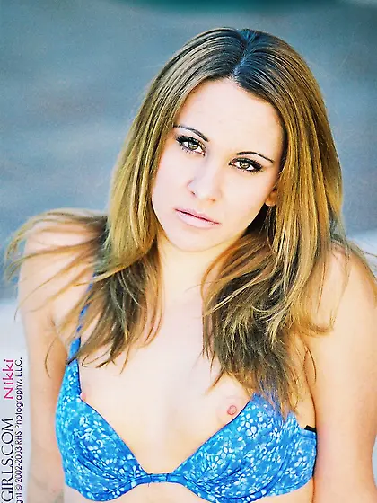 Beautiful blonde gal Nikki FTV strips her blue bikini and shows