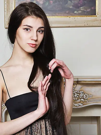 Nude brunette poses vintage