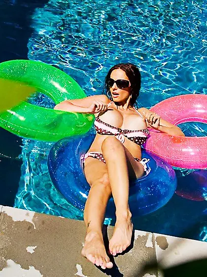 Catalina Cruz with big bust and ultra long legs takes her bikini