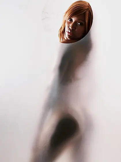 Deliciously sexy dark skinned model Lyric BMD in bikini poses on