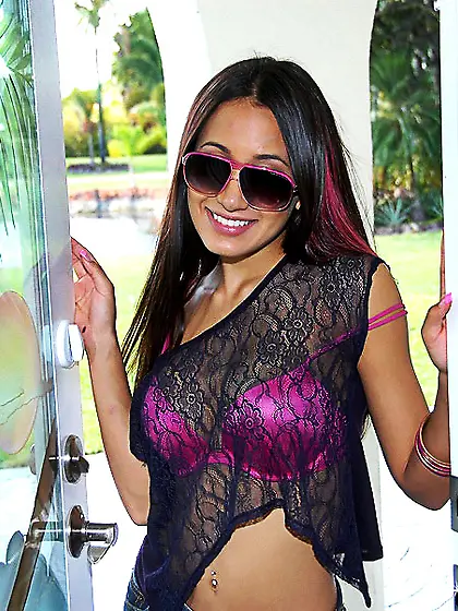 Latina girl with a thong is showing her flexibility right here