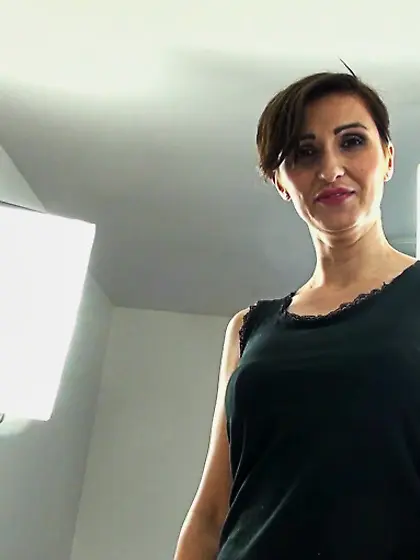 Short-haired brown-eyed milf tats