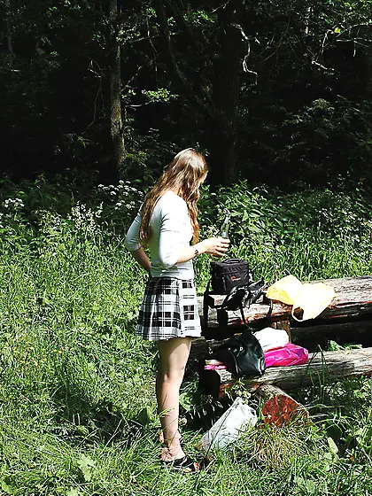 Pissing outdoor on huge plantain leaves