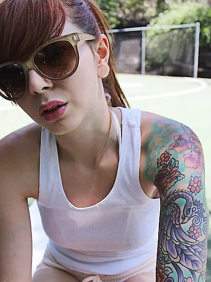 Gorgeous redhead babe Ivy Jean shows off her fantastic bod in ou