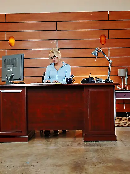 Classy blonde model Riley Evans strips her black skirt and shows