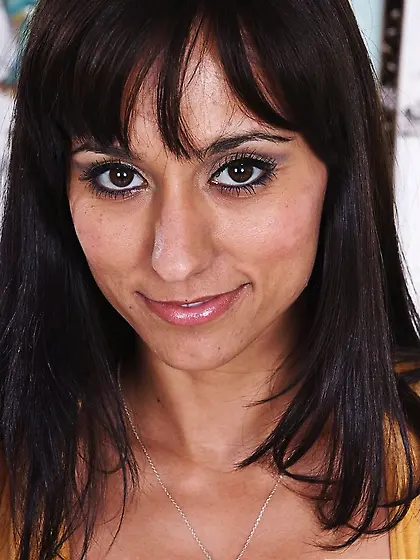 Attractive brunette Reena Sky with good butt wearing purple thon