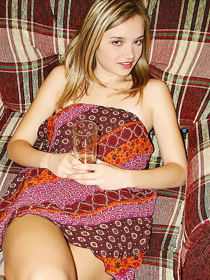 Horny teen Kristina Fey takes off her clothes on the sofa and sh