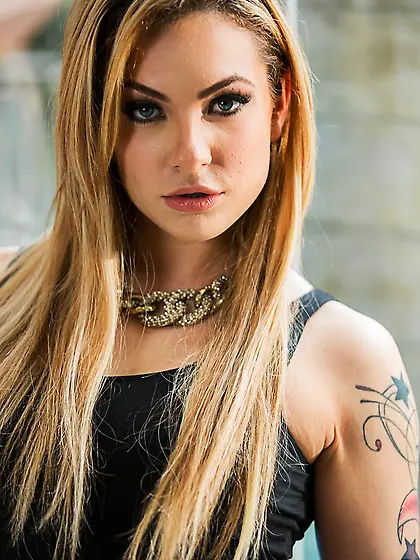 Attractive gal in sexy stockings seductively poses by window wai