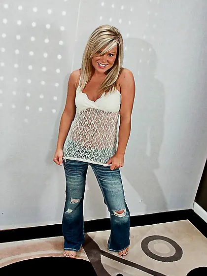 Blonde chick Meet Madden is looking into camera and slowly takin