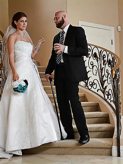 Photographer is having sex with a bride in her wedding dress