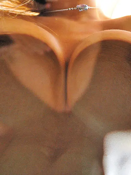 Big boobs blonde twists her nips and fucks her pussy with a glas