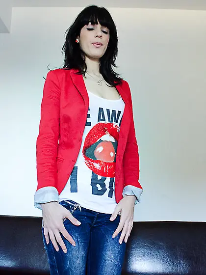 Awesome brunette wearing red lingerie is massaging her clit and