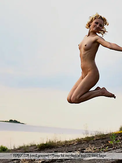 Lena L loves summer and that is why she is gonna pose naked outd