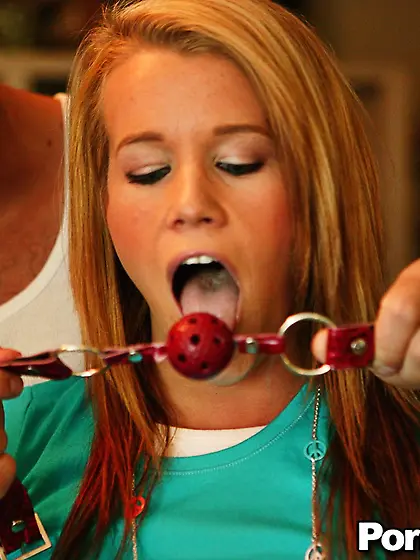 Bondaged redhead teen girl